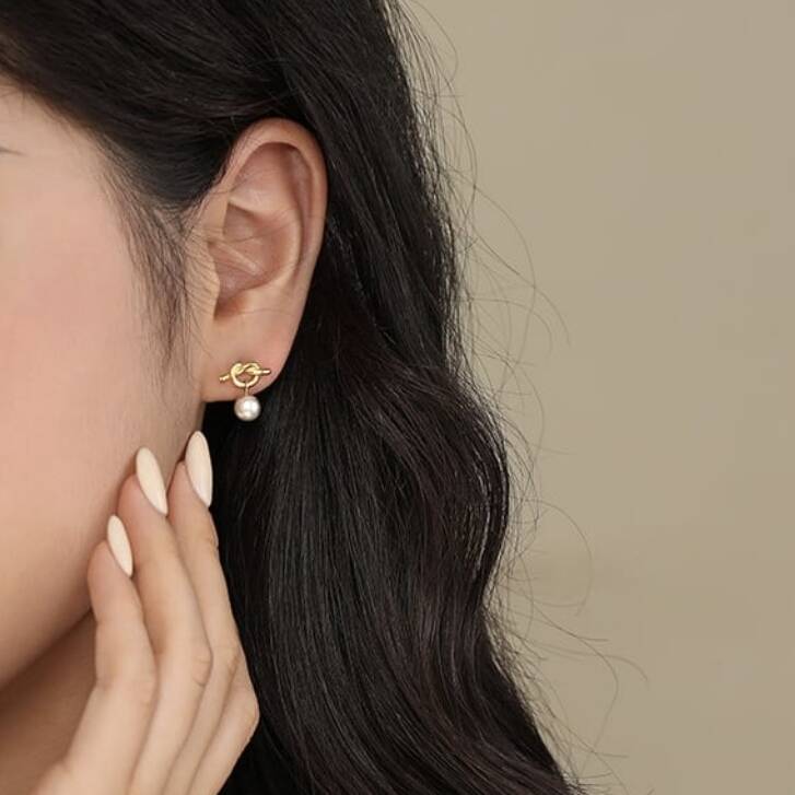 Gold Plated Knot And Pearl Stud Earrings